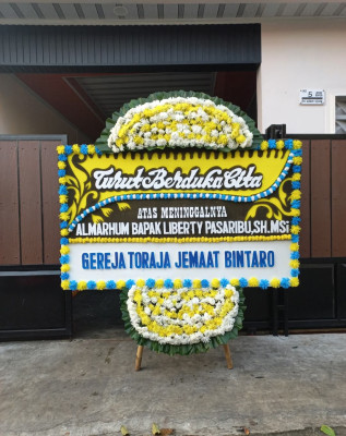 Papan Bunga Duka di Nioga